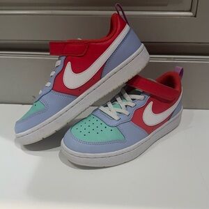 Nike Sneakers with Red, Blue, and Green Accents